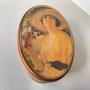 Collectible vintage tin cans. Cora-Cola lady storage collectible